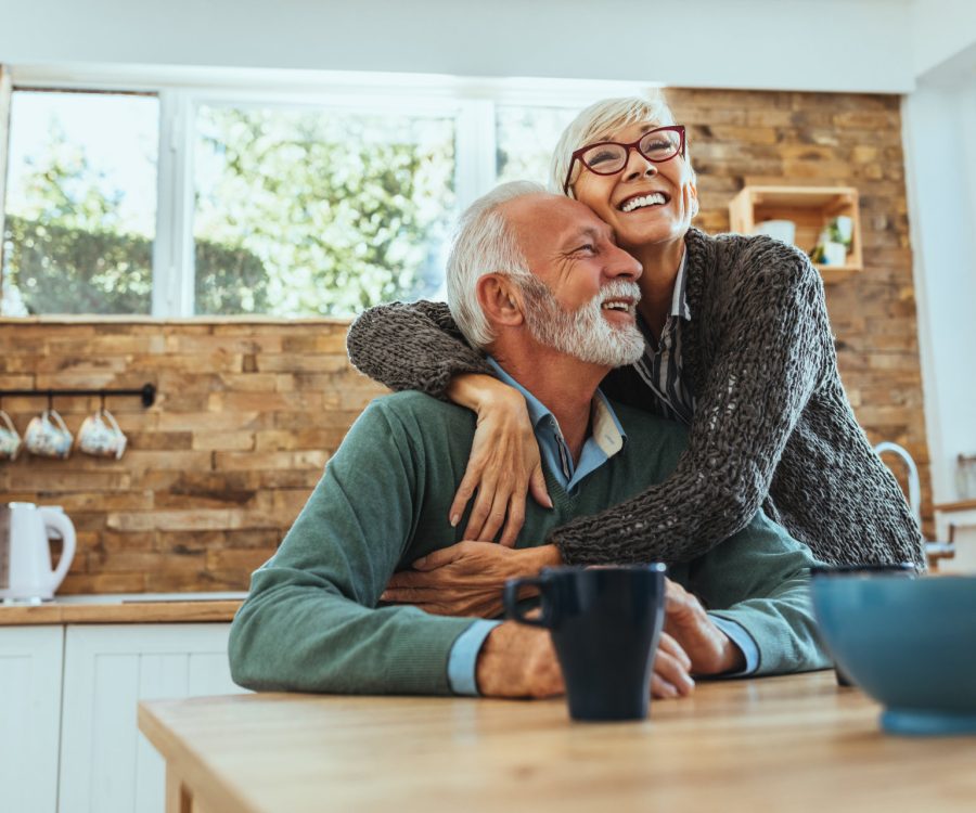 Shot of a mature woman hugging her husband